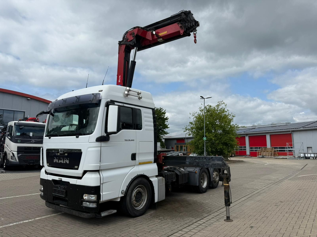 MAN TGX 26.440 6x2 mit HMF 3000-5 Kran TÜV NEU - Τράκτορας: φωτογραφία 1 MAN TGX 26.440 6x2 mit HMF 3000-5 Kran TÜV NEU - Τράκτορας: φωτογραφία 1