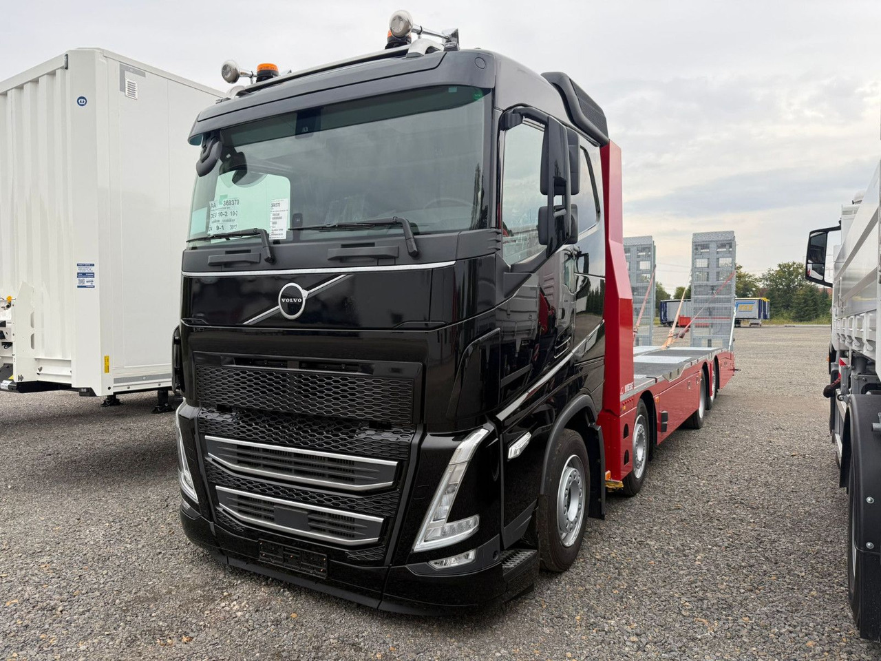 Volvo Arbeitsbühnen Baumaschinentransporter mit Rampen - Φορτηγό αυτοκινητάμαξα: φωτογραφία 2 Volvo Arbeitsbühnen Baumaschinentransporter mit Rampen - Φορτηγό αυτοκινητάμαξα: φωτογραφία 2