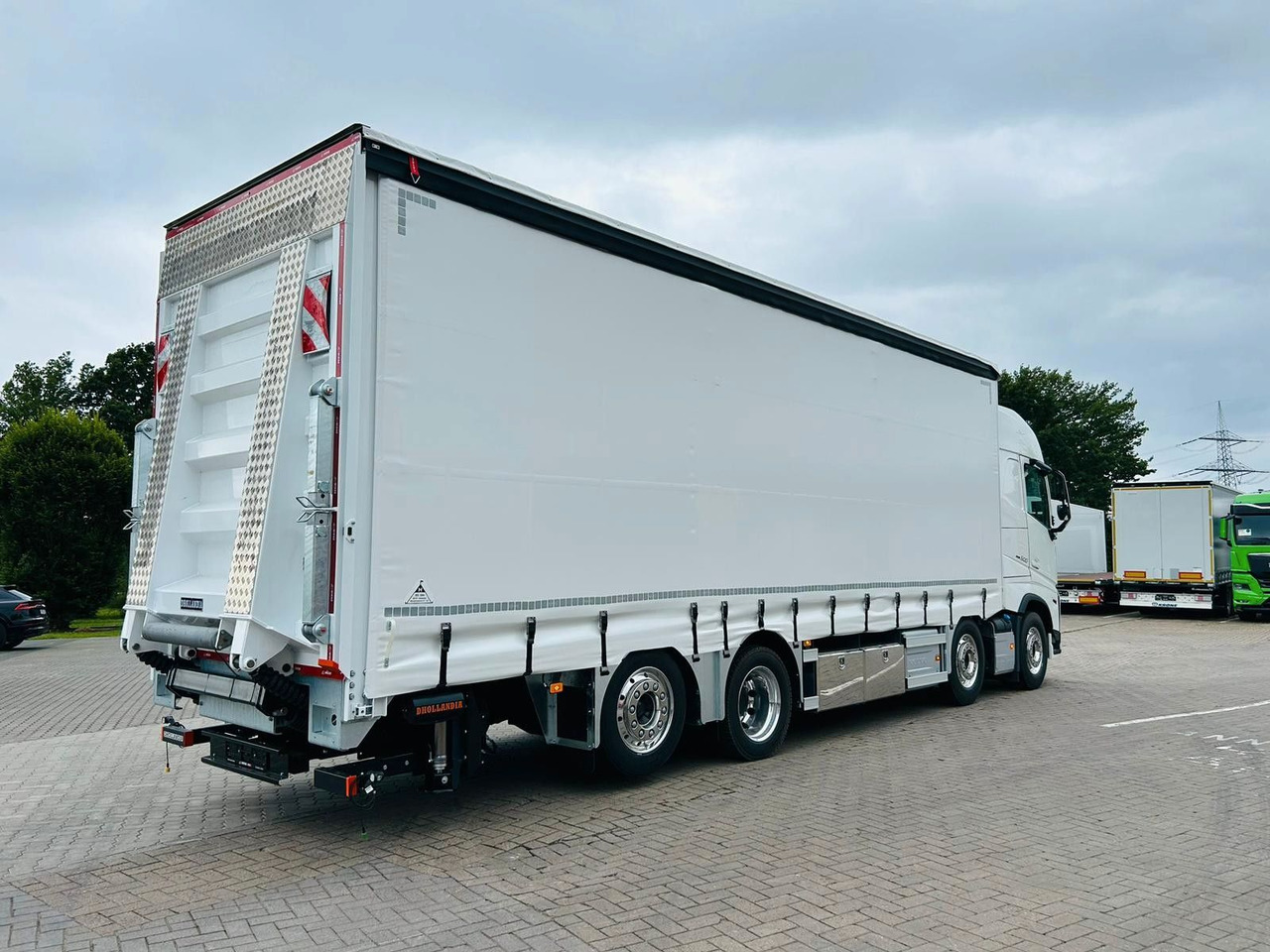 Volvo FH 500 Gabelstaplertransporter LBW Dhollandia 9t - Φορτηγό: φωτογραφία 1 Volvo FH 500 Gabelstaplertransporter LBW Dhollandia 9t - Φορτηγό: φωτογραφία 1