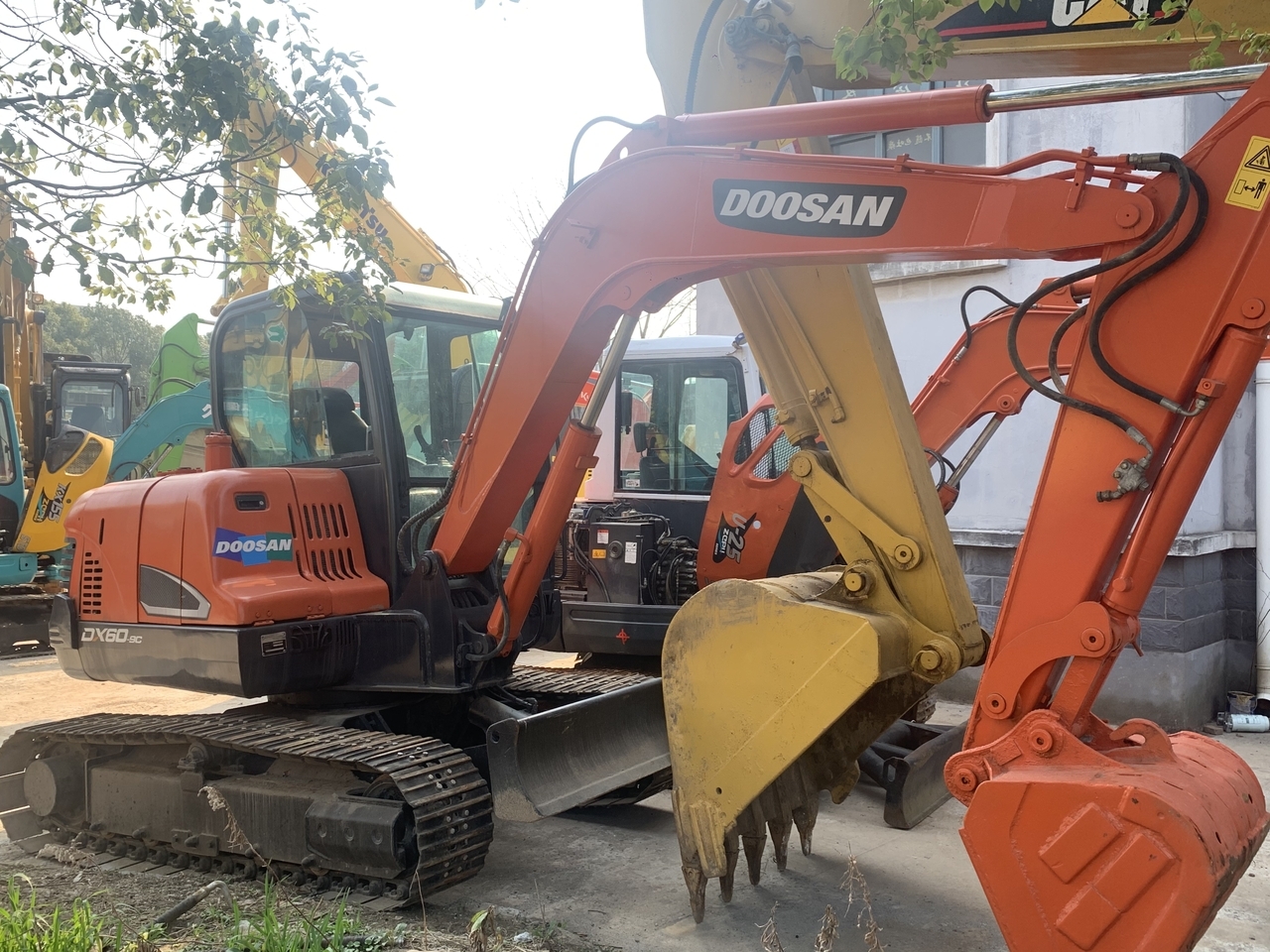 DOOSAN DX60-9 - Μίνι εκσκαφέας: φωτογραφία 1 DOOSAN DX60-9 - Μίνι εκσκαφέας: φωτογραφία 1