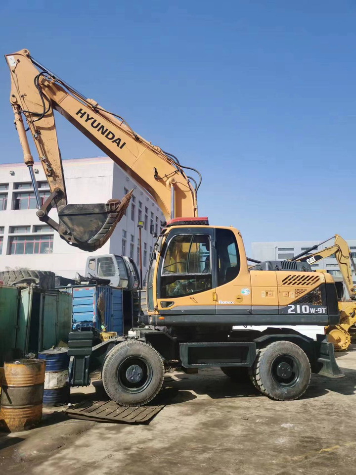 HYUNDAI 210W-9 - Τροχοφόρος εκσκαφέας: φωτογραφία 1 HYUNDAI 210W-9 - Τροχοφόρος εκσκαφέας: φωτογραφία 1