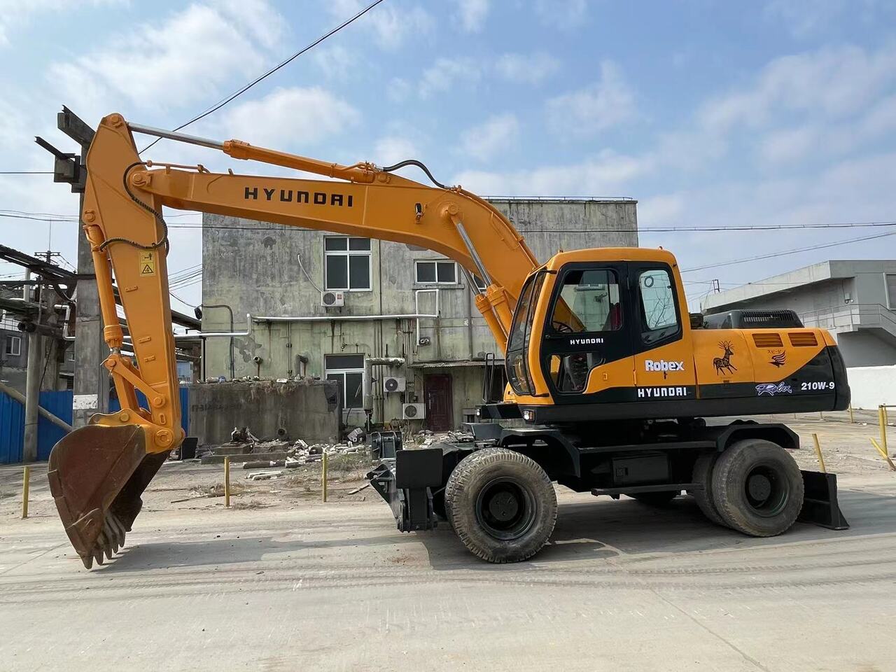 HYUNDAI 210W-9 - Τροχοφόρος εκσκαφέας: φωτογραφία 1 HYUNDAI 210W-9 - Τροχοφόρος εκσκαφέας: φωτογραφία 1