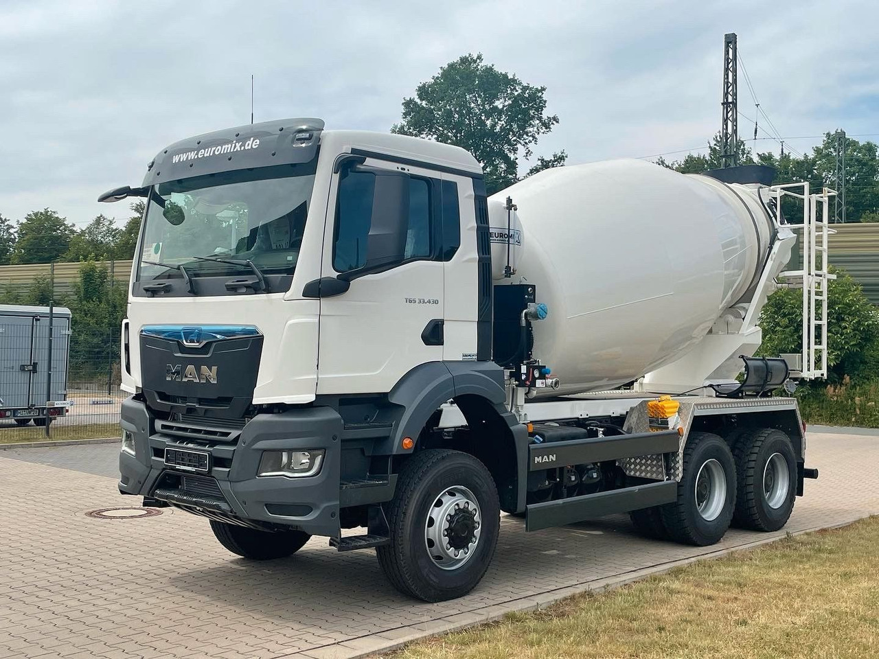 MAN TGS 33.440 / 6X6 Euro6e Euromix MTP EM 7 L - Μπετονιέρα φορτηγό: φωτογραφία 2 MAN TGS 33.440 / 6X6 Euro6e Euromix MTP EM 7 L - Μπετονιέρα φορτηγό: φωτογραφία 2