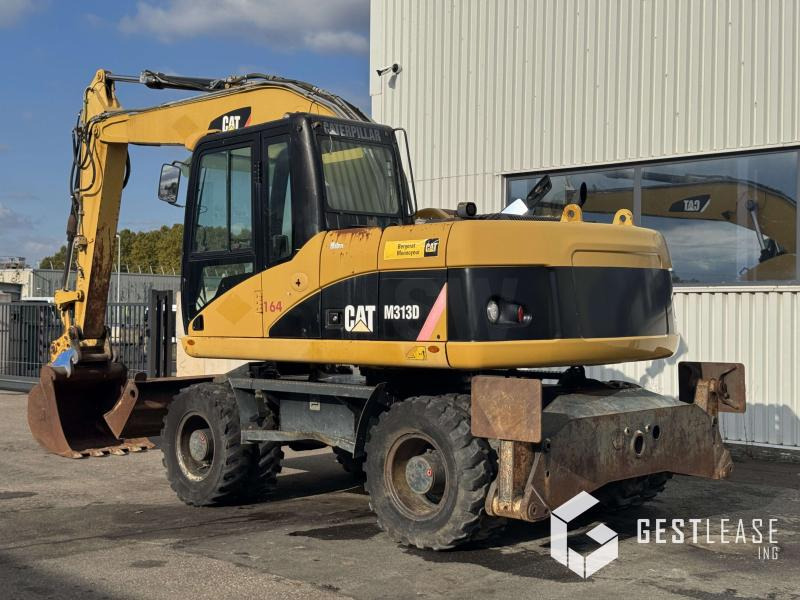 Caterpillar M313D - Τροχοφόρος εκσκαφέας: φωτογραφία 2 Caterpillar M313D - Τροχοφόρος εκσκαφέας: φωτογραφία 2