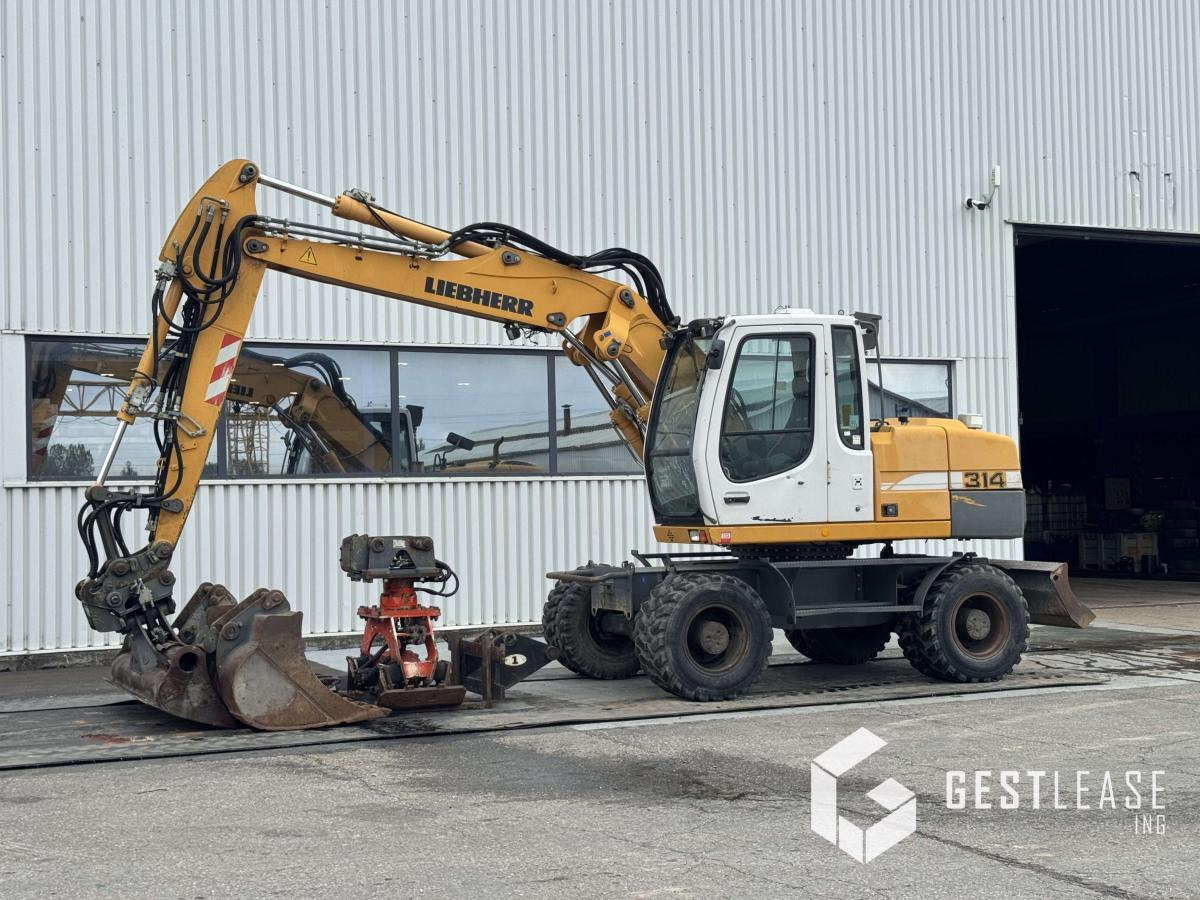 Liebherr A314 Litronic - Τροχοφόρος εκσκαφέας: φωτογραφία 1 Liebherr A314 Litronic - Τροχοφόρος εκσκαφέας: φωτογραφία 1