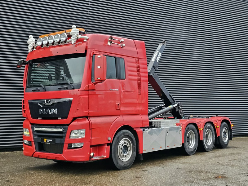 MAN TGX 35.500 / 8x4-4 / HOOKLIFT / ABROLL-KIPPER - Φορτηγό φόρτωσης γάντζου: φωτογραφία 1 MAN TGX 35.500 / 8x4-4 / HOOKLIFT / ABROLL-KIPPER - Φορτηγό φόρτωσης γάντζου: φωτογραφία 1