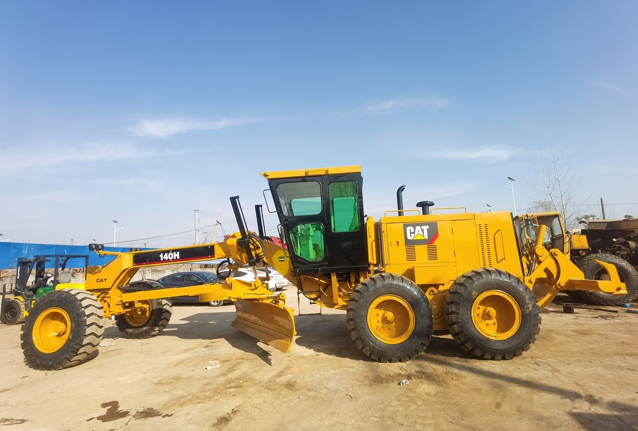 Caterpillar 140H - Γκρέιντερ: φωτογραφία 1 Caterpillar 140H - Γκρέιντερ: φωτογραφία 1
