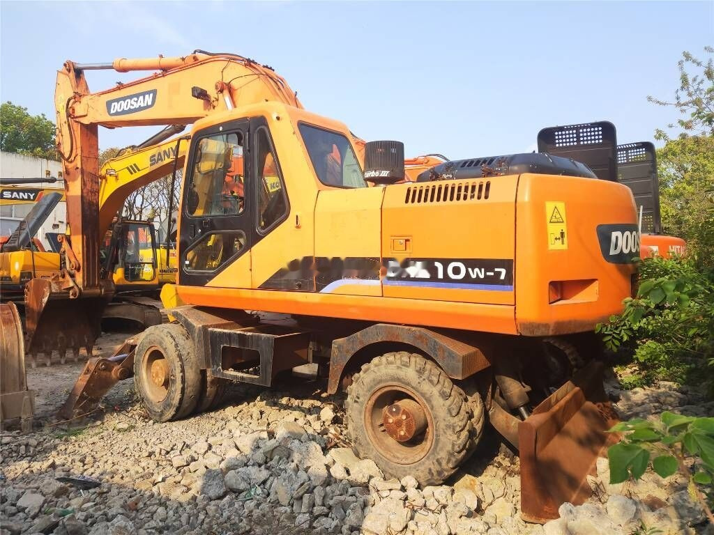 Doosan DH 210 W-7 - Τροχοφόρος εκσκαφέας: φωτογραφία 1 Doosan DH 210 W-7 - Τροχοφόρος εκσκαφέας: φωτογραφία 1