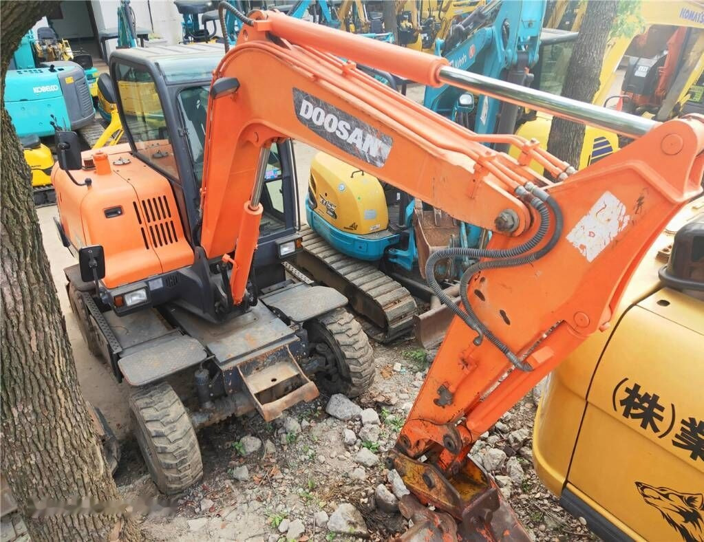 Doosan DX60 W - Τροχοφόρος εκσκαφέας: φωτογραφία 5 Doosan DX60 W - Τροχοφόρος εκσκαφέας: φωτογραφία 5