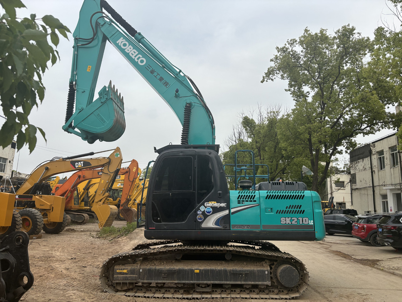 KOBELCO SK210LC - Ερπυστριοφόρος εκσκαφέας: φωτογραφία 1 KOBELCO SK210LC - Ερπυστριοφόρος εκσκαφέας: φωτογραφία 1