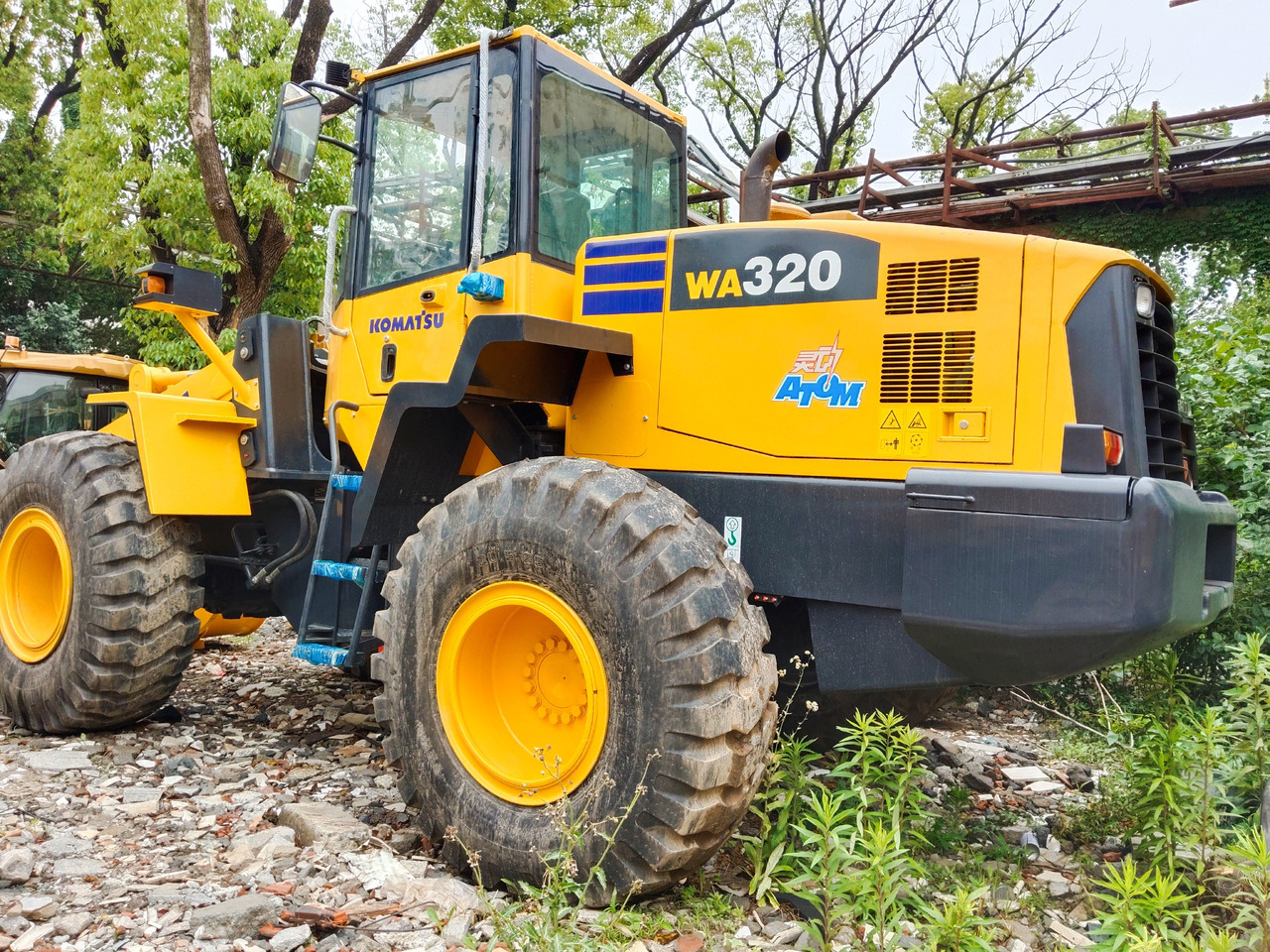 KOMATSU WA 320 WA320-5 - Ελαστιχοφόρος φορτωτής: φωτογραφία 1 KOMATSU WA 320 WA320-5 - Ελαστιχοφόρος φορτωτής: φωτογραφία 1