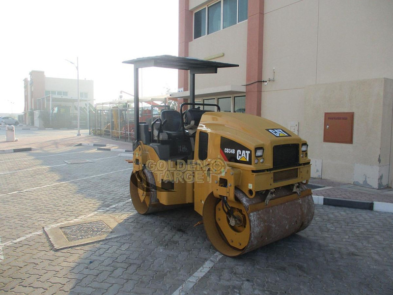 Caterpillar CB34B Tandem Roller - Φρεζοσβαρνα: φωτογραφία 1 Caterpillar CB34B Tandem Roller - Φρεζοσβαρνα: φωτογραφία 1