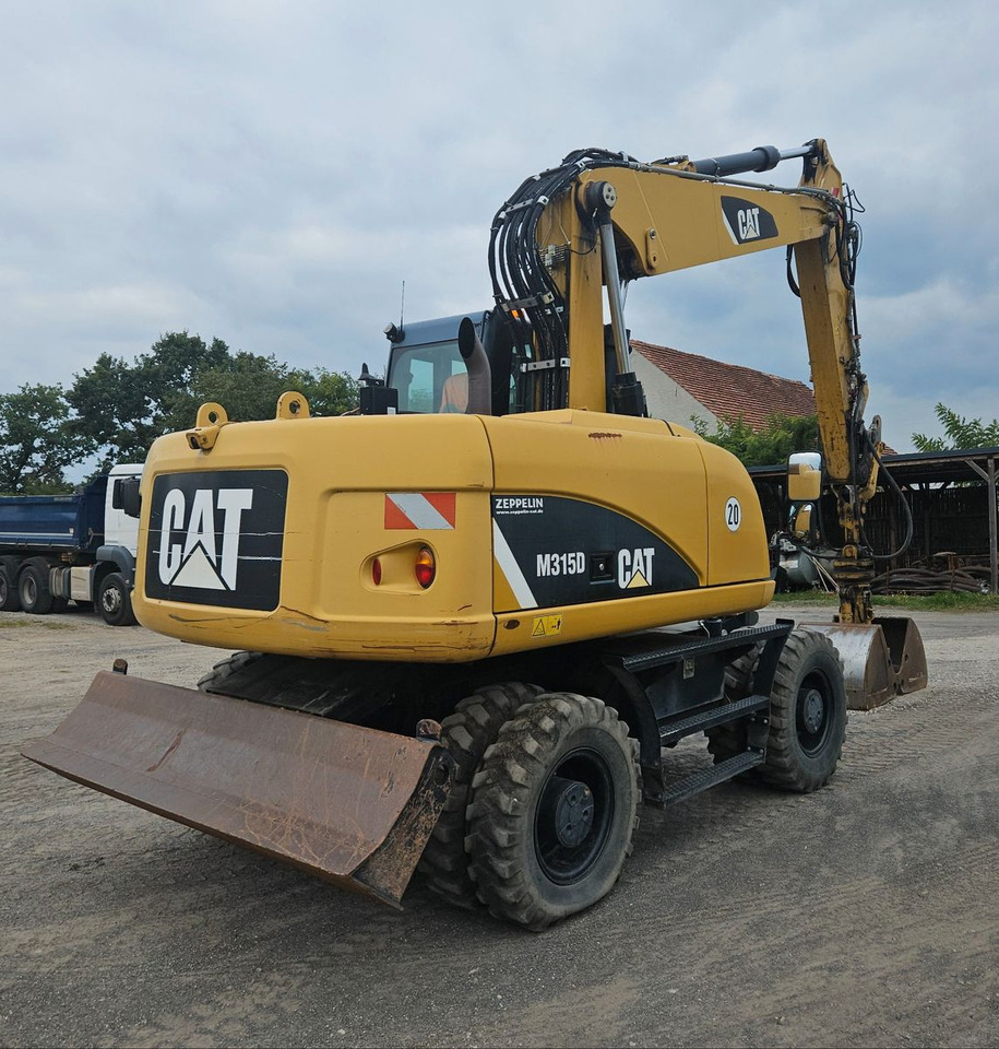 CAT M315D orig. 4.129h - Τροχοφόρος εκσκαφέας: φωτογραφία 2 CAT M315D orig. 4.129h - Τροχοφόρος εκσκαφέας: φωτογραφία 2