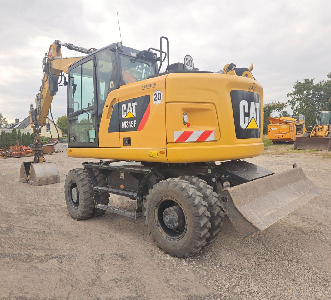 CAT M315F, orig. 2.828h - Τροχοφόρος εκσκαφέας: φωτογραφία 2 CAT M315F, orig. 2.828h - Τροχοφόρος εκσκαφέας: φωτογραφία 2