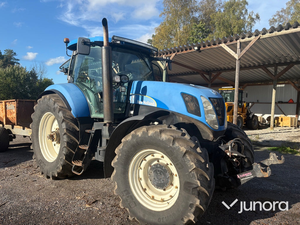 Traktor - New Holland T7040 - Τρακτέρ: φωτογραφία 1 Traktor - New Holland T7040 - Τρακτέρ: φωτογραφία 1