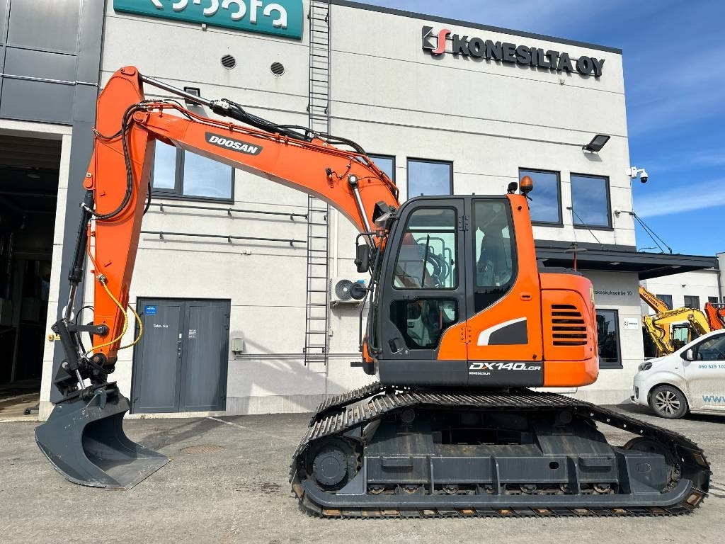 Doosan DX 140 LCR-5 metsäalusta - Ερπυστριοφόρος εκσκαφέας: φωτογραφία 1 Doosan DX 140 LCR-5 metsäalusta - Ερπυστριοφόρος εκσκαφέας: φωτογραφία 1