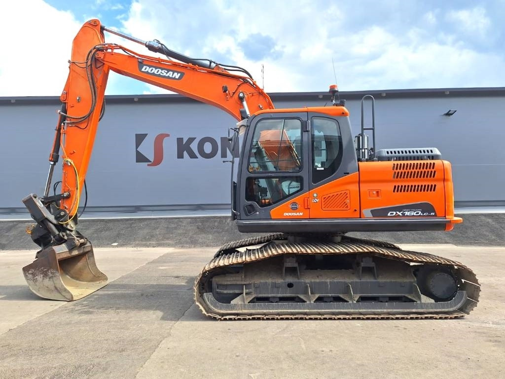Doosan DX160LCH-5 METSÄMALLI KALLISTAJALLA - Ερπυστριοφόρος εκσκαφέας: φωτογραφία 1 Doosan DX160LCH-5 METSÄMALLI KALLISTAJALLA - Ερπυστριοφόρος εκσκαφέας: φωτογραφία 1