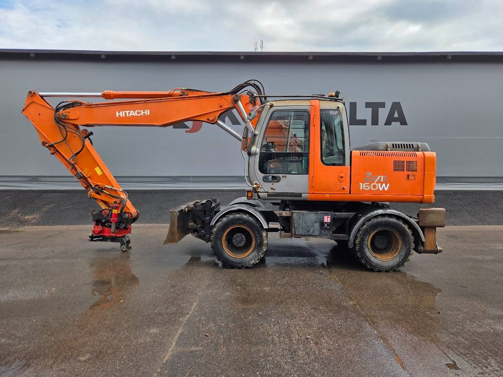 Hitachi ZX160 W PYÖRITTÄJÄLLÄ - Τροχοφόρος εκσκαφέας: φωτογραφία 1 Hitachi ZX160 W PYÖRITTÄJÄLLÄ - Τροχοφόρος εκσκαφέας: φωτογραφία 1