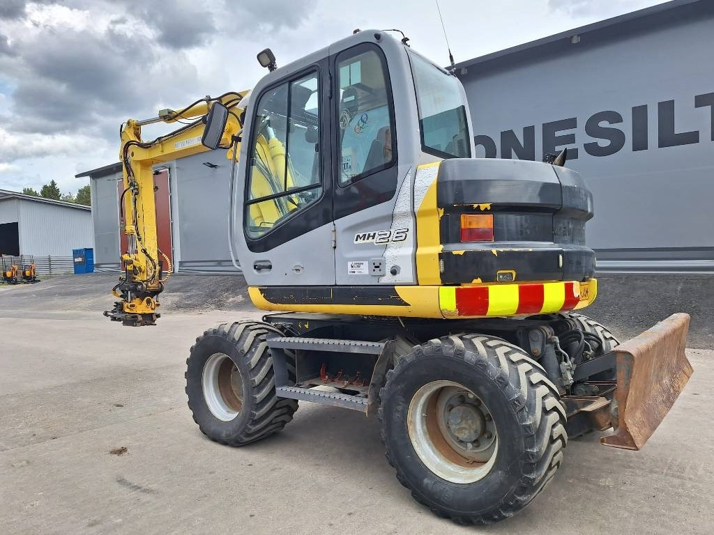 New Holland MH2.6 ENGCON PIHDEILLÄ - Τροχοφόρος εκσκαφέας: φωτογραφία 2 New Holland MH2.6 ENGCON PIHDEILLÄ - Τροχοφόρος εκσκαφέας: φωτογραφία 2