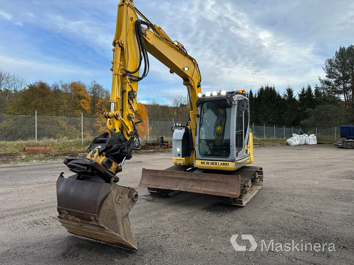 Grävmaskin New Holland Kobelco E70BSR-2 - Ερπυστριοφόρος εκσκαφέας: φωτογραφία 3 Grävmaskin New Holland Kobelco E70BSR-2 - Ερπυστριοφόρος εκσκαφέας: φωτογραφία 3