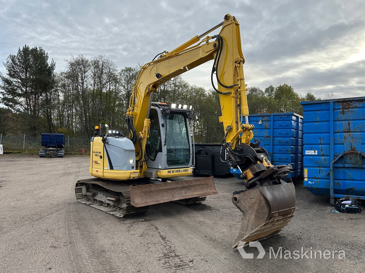 Grävmaskin New Holland Kobelco E70BSR-2 - Ερπυστριοφόρος εκσκαφέας: φωτογραφία 1 Grävmaskin New Holland Kobelco E70BSR-2 - Ερπυστριοφόρος εκσκαφέας: φωτογραφία 1