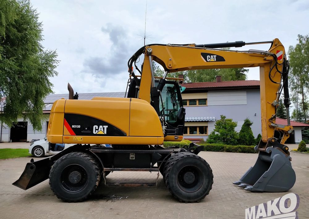 Caterpillar M313D - Τροχοφόρος εκσκαφέας: φωτογραφία 5 Caterpillar M313D - Τροχοφόρος εκσκαφέας: φωτογραφία 5