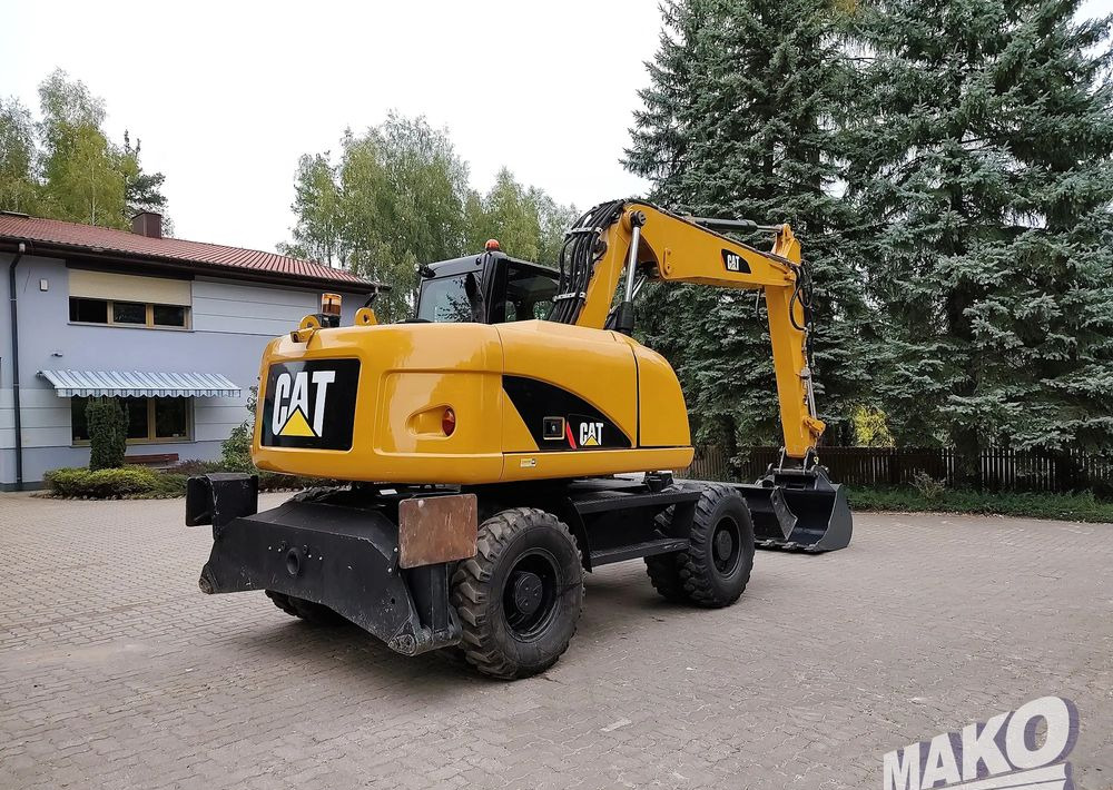 Caterpillar M313D - Τροχοφόρος εκσκαφέας: φωτογραφία 4 Caterpillar M313D - Τροχοφόρος εκσκαφέας: φωτογραφία 4