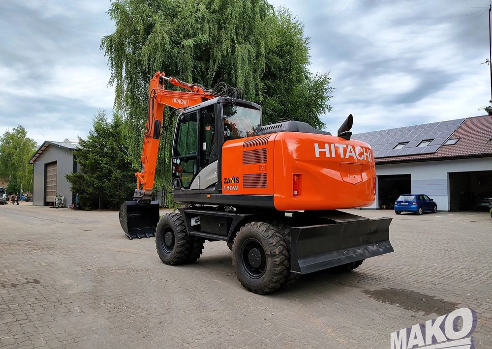 Hitachi ZX 140 - Τροχοφόρος εκσκαφέας: φωτογραφία 2 Hitachi ZX 140 - Τροχοφόρος εκσκαφέας: φωτογραφία 2