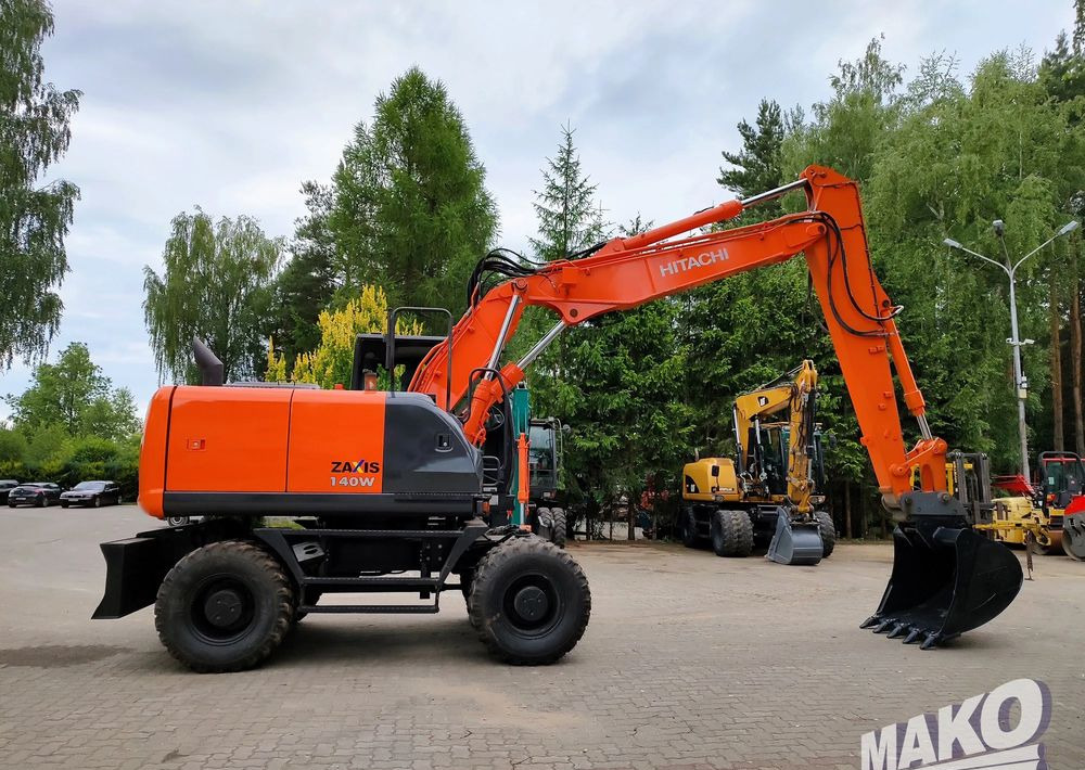 Hitachi ZX 140 - Τροχοφόρος εκσκαφέας: φωτογραφία 5 Hitachi ZX 140 - Τροχοφόρος εκσκαφέας: φωτογραφία 5