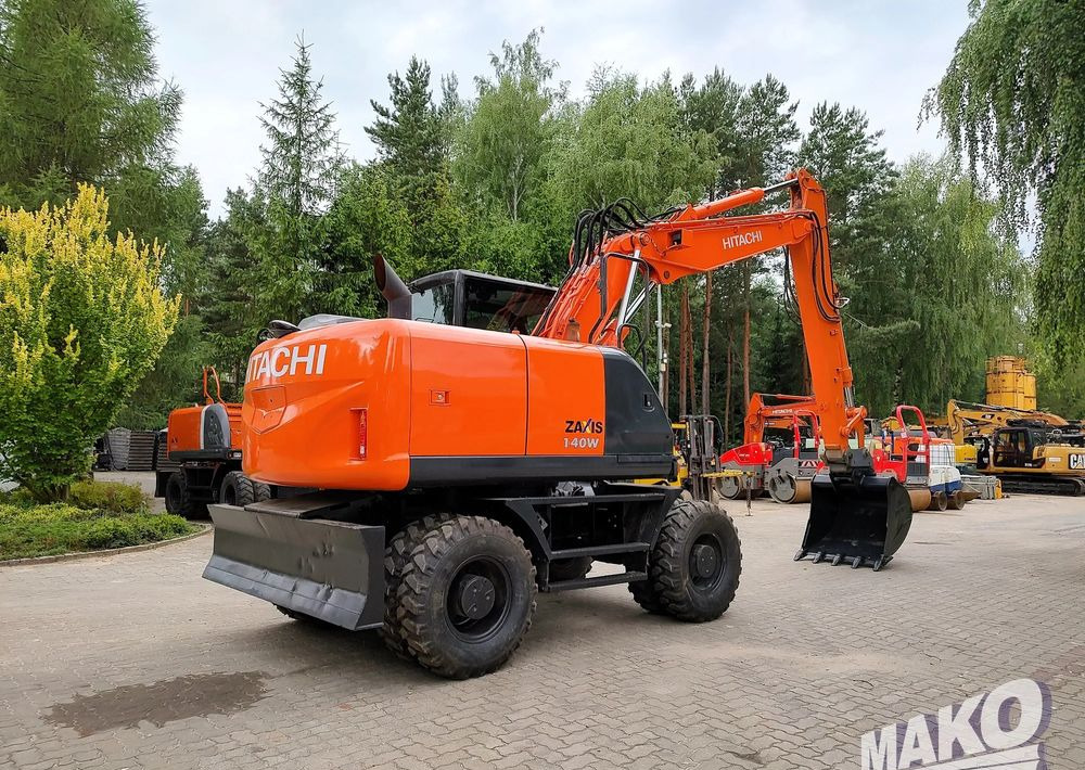 Hitachi ZX 140 - Τροχοφόρος εκσκαφέας: φωτογραφία 4 Hitachi ZX 140 - Τροχοφόρος εκσκαφέας: φωτογραφία 4