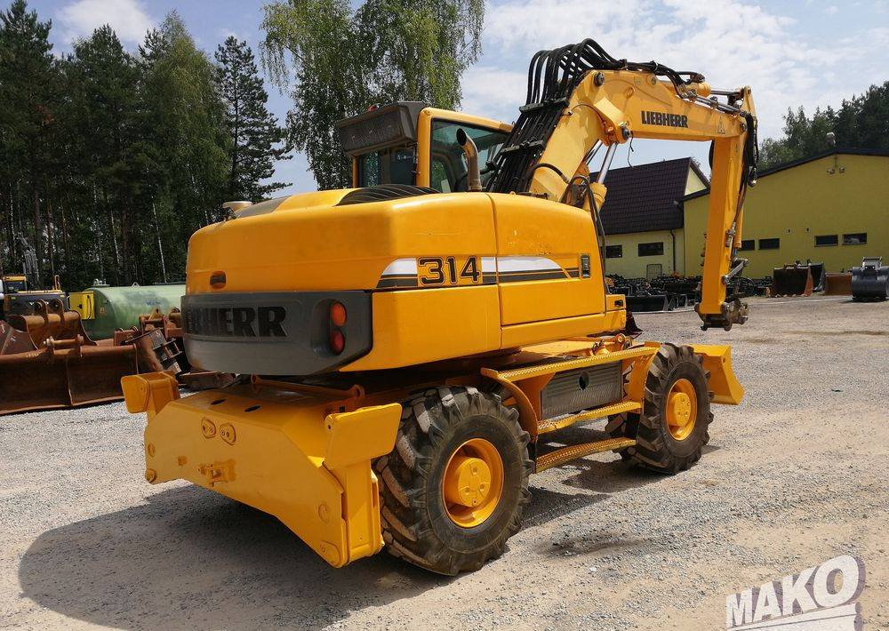 Liebherr A 314 Litronic - Τροχοφόρος εκσκαφέας: φωτογραφία 5 Liebherr A 314 Litronic - Τροχοφόρος εκσκαφέας: φωτογραφία 5