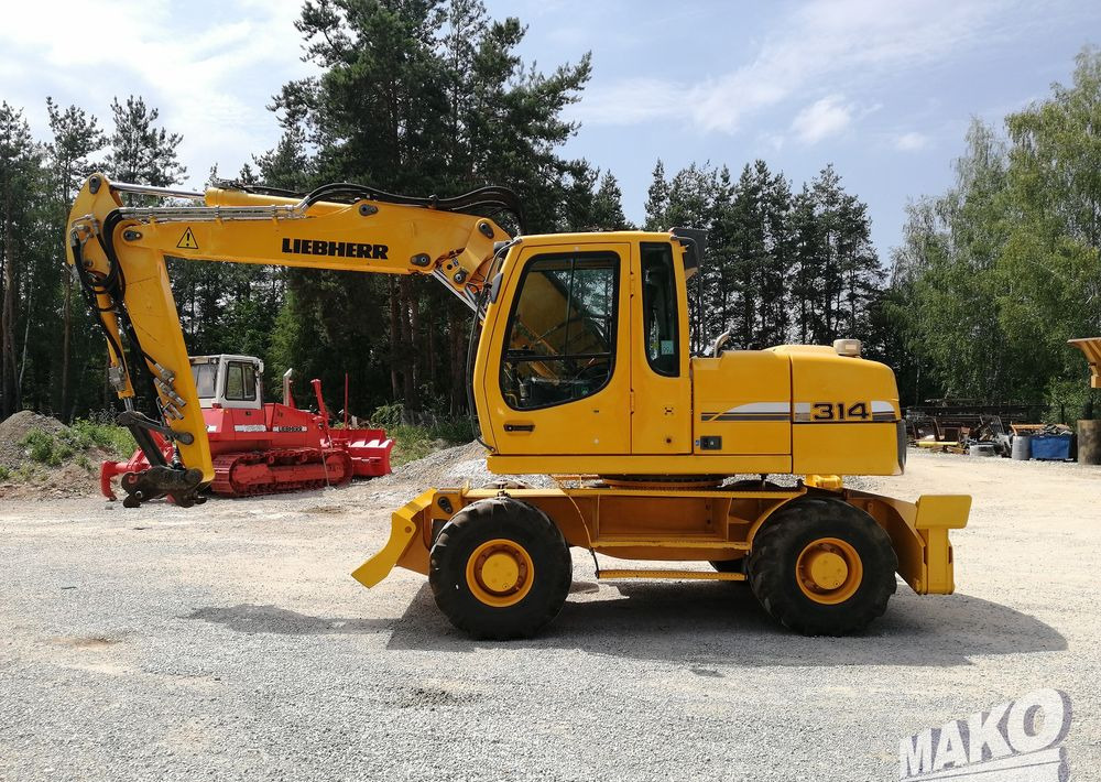 Liebherr A 314 Litronic - Τροχοφόρος εκσκαφέας: φωτογραφία 2 Liebherr A 314 Litronic - Τροχοφόρος εκσκαφέας: φωτογραφία 2