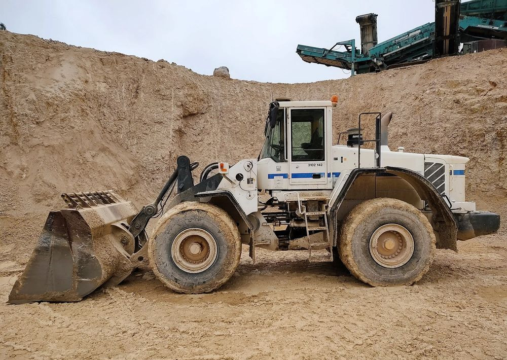 Volvo L180E - Ελαστιχοφόρος φορτωτής: φωτογραφία 2 Volvo L180E - Ελαστιχοφόρος φορτωτής: φωτογραφία 2