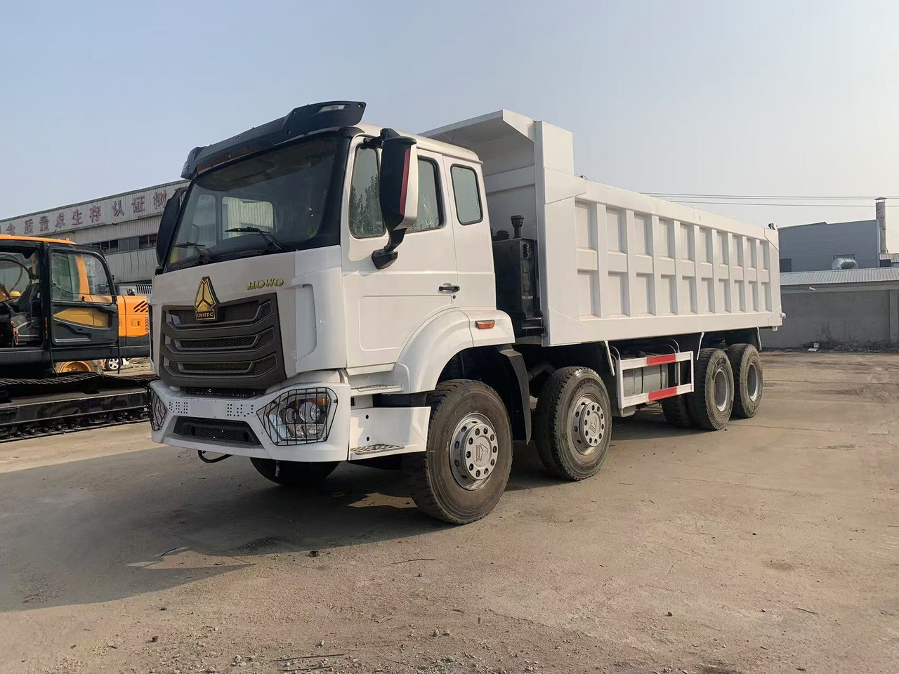 Howo 8x4 Tipper Truck Used Condition HOWO Dumper Truck Left Hand Drive - Φορτηγό ανατρεπόμενο: φωτογραφία 2 Howo 8x4 Tipper Truck Used Condition HOWO Dumper Truck Left Hand Drive - Φορτηγό ανατρεπόμενο: φωτογραφία 2