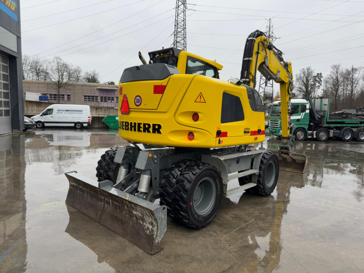 LIEBHERR 910 Compact Litronic Powertilt - Τροχοφόρος εκσκαφέας: φωτογραφία 4 LIEBHERR 910 Compact Litronic Powertilt - Τροχοφόρος εκσκαφέας: φωτογραφία 4