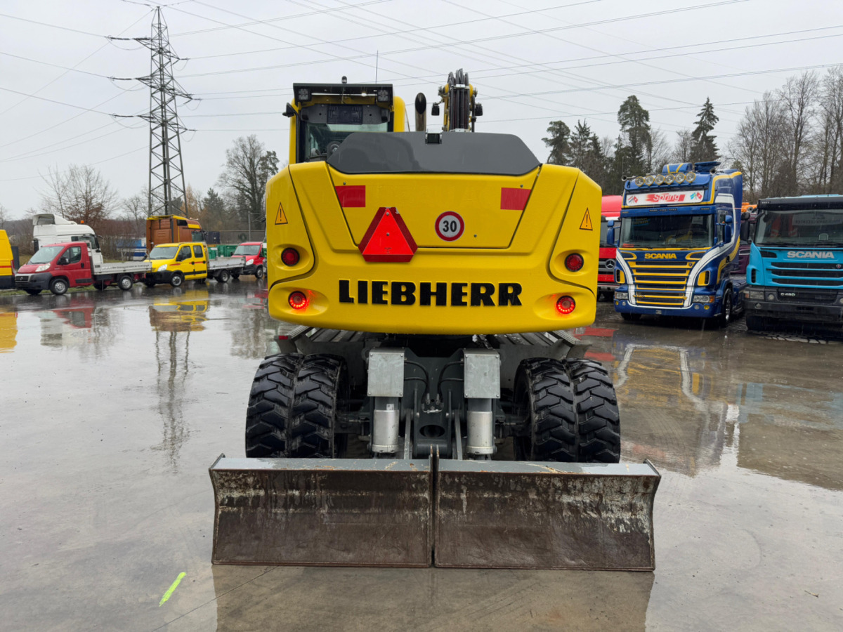 LIEBHERR 910 Compact Litronic Powertilt - Τροχοφόρος εκσκαφέας: φωτογραφία 5 LIEBHERR 910 Compact Litronic Powertilt - Τροχοφόρος εκσκαφέας: φωτογραφία 5