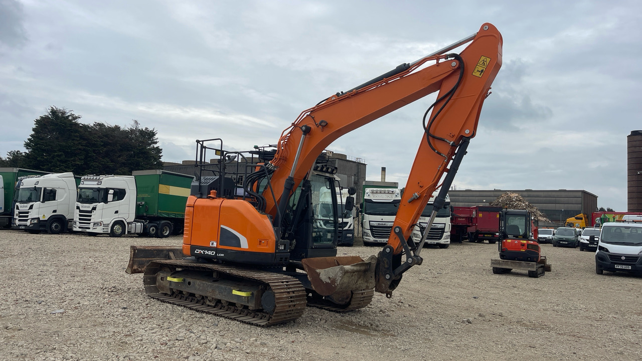 DOOSAN DX140LCR-5 - Ερπυστριοφόρος εκσκαφέας: φωτογραφία 1 DOOSAN DX140LCR-5 - Ερπυστριοφόρος εκσκαφέας: φωτογραφία 1
