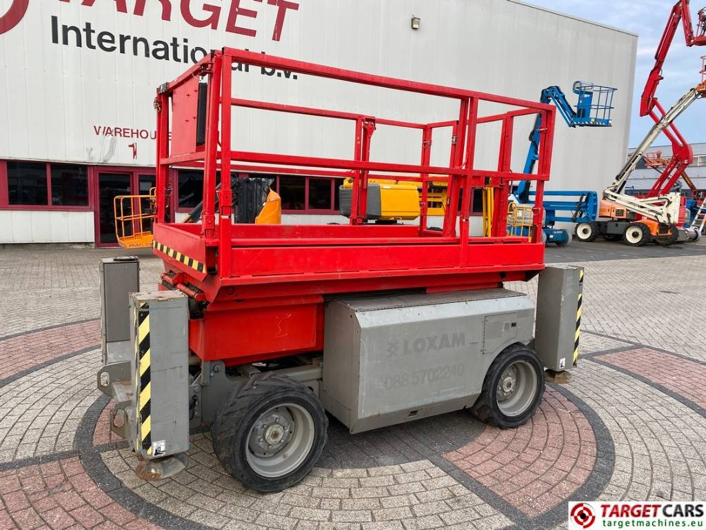 Genie GS-2668RT Diesel 4x4 Scissor Work Lift 992cm - Ψαλιδωτό ανυψωτικό: φωτογραφία 1 Genie GS-2668RT Diesel 4x4 Scissor Work Lift 992cm - Ψαλιδωτό ανυψωτικό: φωτογραφία 1