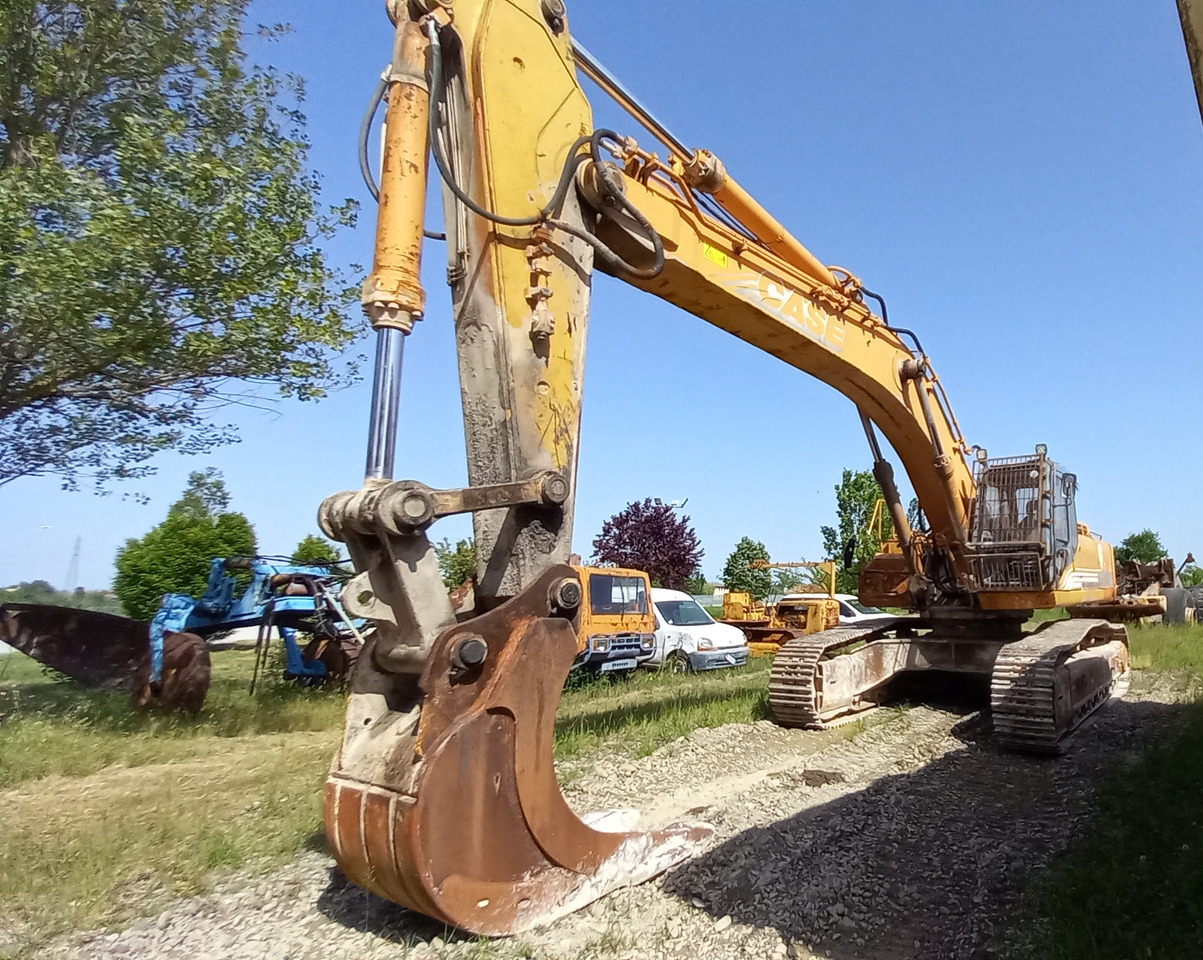 CASE Poclain 9046 Escavatore cingolato completo di cabina Rops-Fops con griglia frontale. Impianto martello. Benna. - Ερπυστριοφόρος εκσκαφέας: φωτογραφία 1 CASE Poclain 9046 Escavatore cingolato completo di cabina Rops-Fops con griglia frontale. Impianto martello. Benna. - Ερπυστριοφόρος εκσκαφέας: φωτογραφία 1