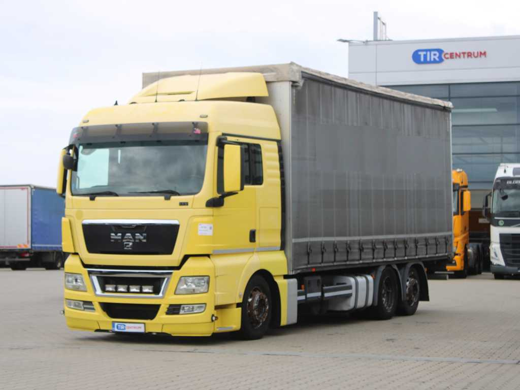 MAN TGX 24.440, EURO 5EEV, 6X2, AIR SUSPENSION - Φορτηγό μουσαμάς: φωτογραφία 1 MAN TGX 24.440, EURO 5EEV, 6X2, AIR SUSPENSION - Φορτηγό μουσαμάς: φωτογραφία 1