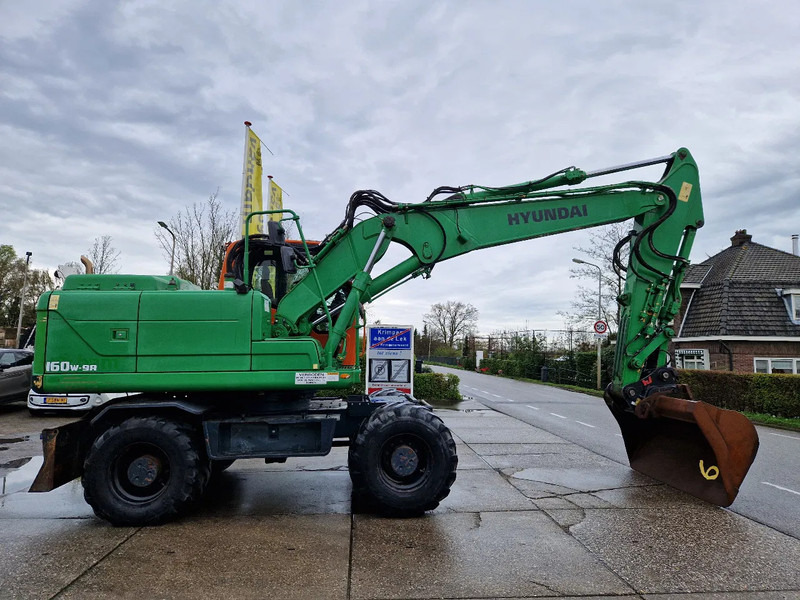 Hyundai Robex 160W-9A met 6-cilinder Cummins motor - Τροχοφόρος εκσκαφέας: φωτογραφία 2 Hyundai Robex 160W-9A met 6-cilinder Cummins motor - Τροχοφόρος εκσκαφέας: φωτογραφία 2
