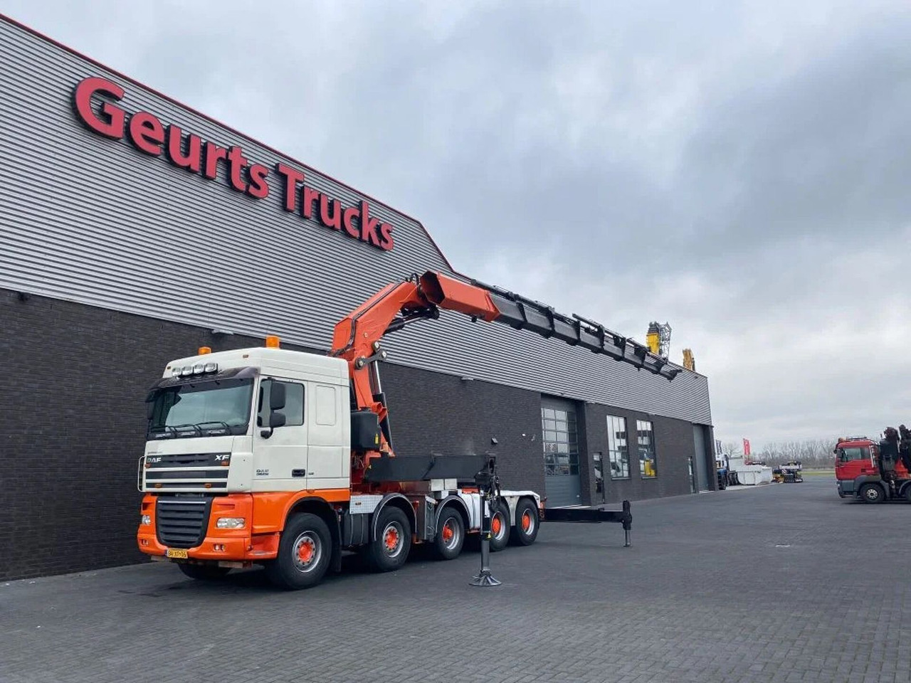 DAF XF 105 10X4 + FASSI F1500AXP.28 KRAAN/KRAN/CRANE - Φορτηγό με γερανό: φωτογραφία 2 DAF XF 105 10X4 + FASSI F1500AXP.28 KRAAN/KRAN/CRANE - Φορτηγό με γερανό: φωτογραφία 2