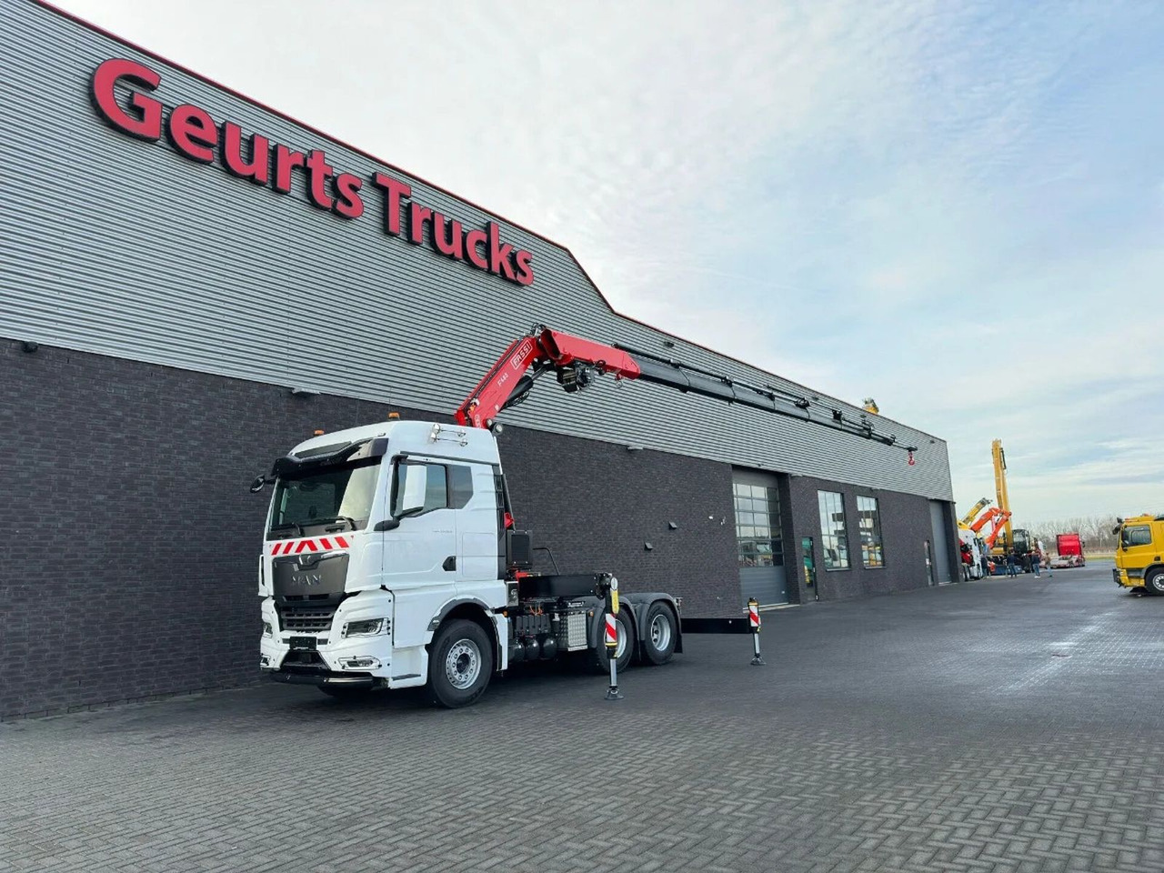 MAN TGX 33.520 6X4 TREKKER-BAKWAGEN COMBI + FASSI F4 - Φορτηγό με γερανό: φωτογραφία 2 MAN TGX 33.520 6X4 TREKKER-BAKWAGEN COMBI + FASSI F4 - Φορτηγό με γερανό: φωτογραφία 2