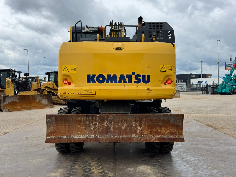 Komatsu PW180-11 - Τροχοφόρος εκσκαφέας: φωτογραφία 4 Komatsu PW180-11 - Τροχοφόρος εκσκαφέας: φωτογραφία 4