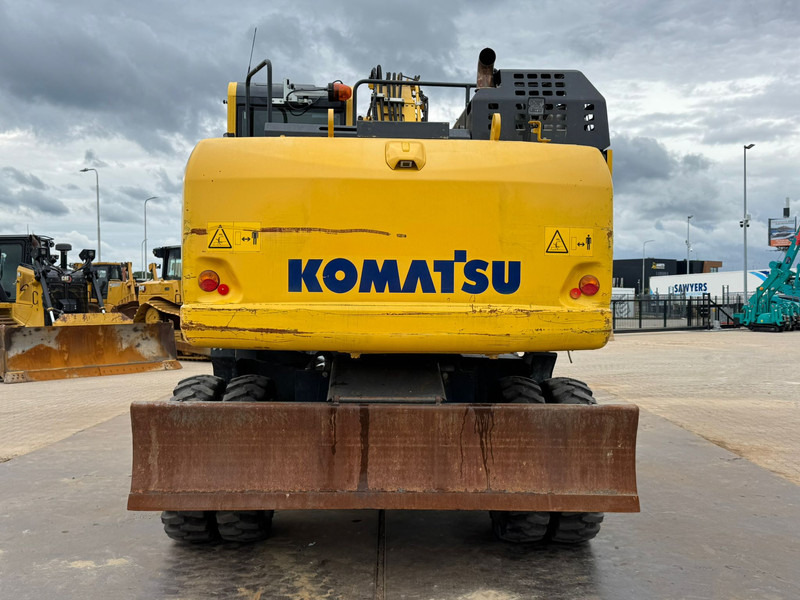 Komatsu PW180-11 - Τροχοφόρος εκσκαφέας: φωτογραφία 4 Komatsu PW180-11 - Τροχοφόρος εκσκαφέας: φωτογραφία 4