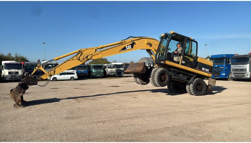 Caterpillar M 316 C - Τροχοφόρος εκσκαφέας: φωτογραφία 5 Caterpillar M 316 C - Τροχοφόρος εκσκαφέας: φωτογραφία 5