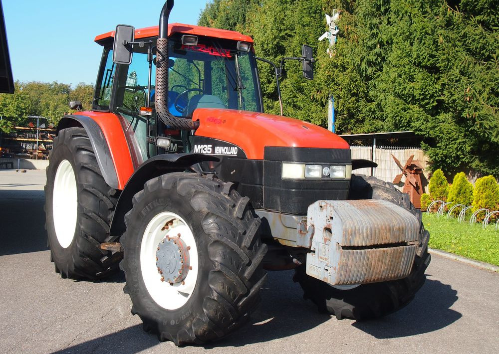 Ciągnik New Holland NH M 135 1998 NEW HOLLAND TM M135 - Τρακτέρ: φωτογραφία 1 Ciągnik New Holland NH M 135 1998 NEW HOLLAND TM M135 - Τρακτέρ: φωτογραφία 1
