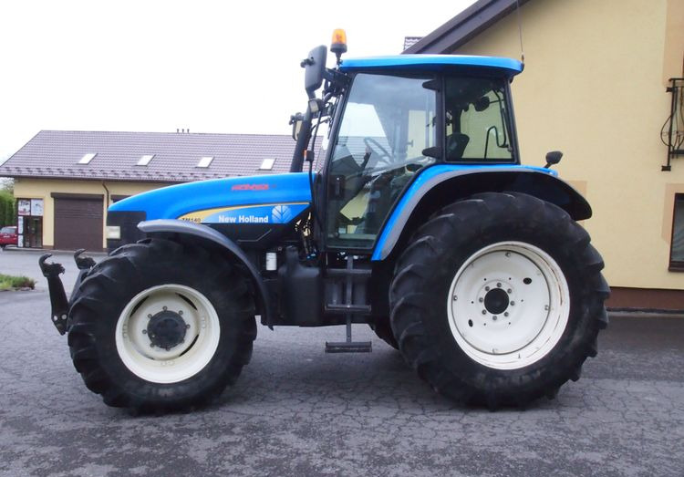 Ciągnik New Holland TM 140 2004 Przedni TUZ - Τρακτέρ: φωτογραφία 5 Ciągnik New Holland TM 140 2004 Przedni TUZ - Τρακτέρ: φωτογραφία 5
