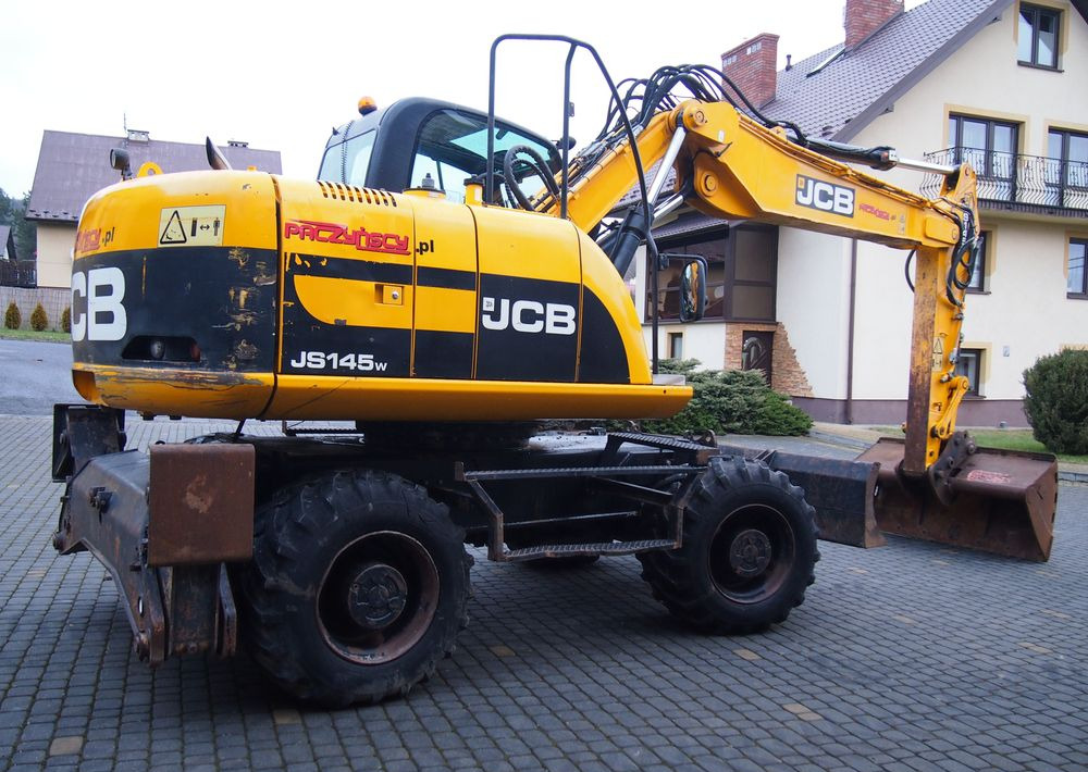 Koparka kołowa JCB JS145W 2011 Koparka JCB - Τροχοφόρος εκσκαφέας: φωτογραφία 2 Koparka kołowa JCB JS145W 2011 Koparka JCB - Τροχοφόρος εκσκαφέας: φωτογραφία 2