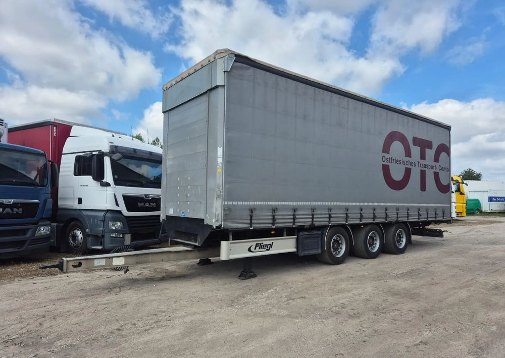Fliegl Tandem 3 osie - Τρέιλερ κουρτίνα: φωτογραφία 1 Fliegl Tandem 3 osie - Τρέιλερ κουρτίνα: φωτογραφία 1